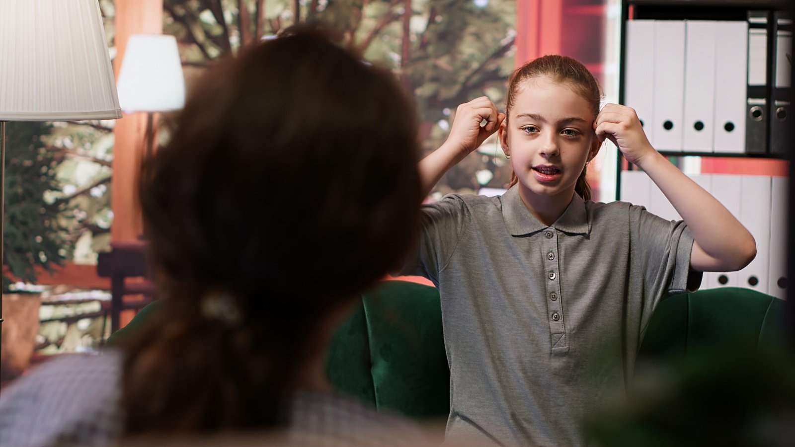 Troubled teen expressing anxiety and mental health issues during therapy